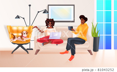 african american couple relaxing at home social media network online communication relaxation concept 81043252