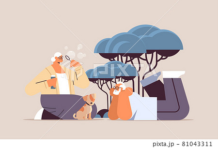 senior couple blowing bubbles and spending time with little dog relaxation retirement concept full length 81043311