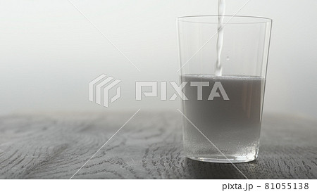 Making espresso tonic in tumbler glass, pour tonic in tumbler glass Making espresso tonic in tumbler glass, pour tonic in tumbler glass 81055138