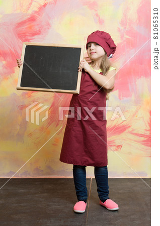 kid, happy girl cook in red chef hat, apron kid, happy girl cook in red chef hat, apron 81065310