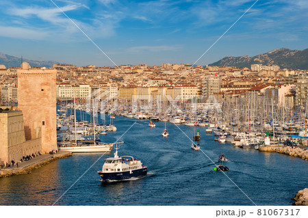 Yachts coming to Marseille Old Port on sunset. Marseille, France Yachts coming to Marseille Old Port on sunset. Marseille, France 81067317