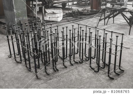 Metal anchor bolts for concrete construction structures, foundation on the background of the reinforcing workshop industrial enterprise Metal anchor bolts for concrete construction structures, foundation on the background of the reinforcing workshop industrial enterprise 81068765