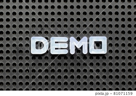 White color letter in word demo on black pegboard background White color letter in word demo on black pegboard background 81071159