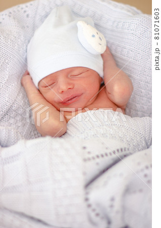 Sleeping newborn baby boy with funny hat. Babyface close-up. Very sweet infant. Sleeping newborn baby boy with funny hat. Babyface close-up. Very sweet infant. 81071603