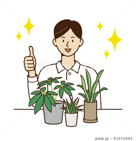 観葉植物を前にいいねの手をする男性 81072693