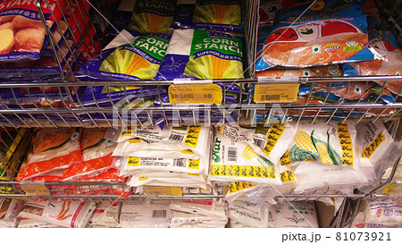 Selected focused on wheat flour of various brands sold in commercial packaging. Packed in plastic bags and displayed with a price tag for the convenience of customers. Selected focused on wheat flour of various brands sold in commercial packaging. Packed in plastic bags and displayed with a price tag for the convenience of customers. 81073921