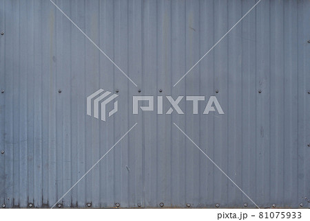 Metal steel strips. Rusty corrugated iron metal, Zinc steel wall, pattern texture background. Close-up of exterior architecture material for design decoration background. Metal steel strips. Rusty corrugated iron metal, Zinc steel wall, pattern texture background. Close-up of exterior architecture material for design decoration background. 81075933