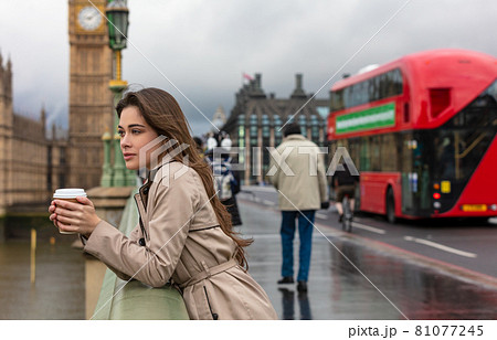 Woman Drinking Coffee on Westminster Bridge, Big Ben, London, England Woman Drinking Coffee on Westminster Bridge, Big Ben, London, England 81077245