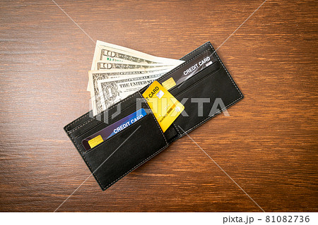 wallet with money and credit card wallet with money and credit card 81082736