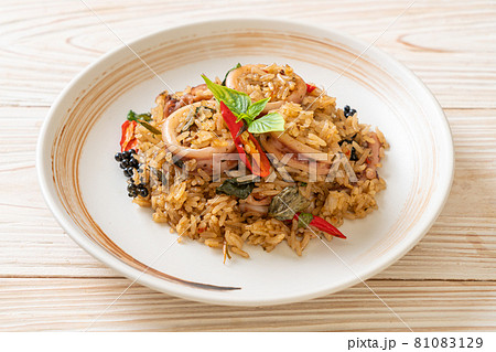 Basil and Spicy Herb Fried Rice with Squid or Octopus 81083129