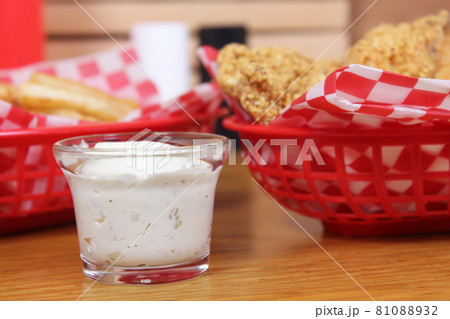 Fried Catfish With Tartar Sauce and French Fries in Cafe Fried Catfish With Tartar Sauce and French Fries in Cafe 81088932