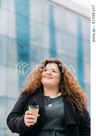 coffee lover pleased curvy woman enjoying moment 81090147