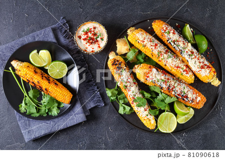 Elote, Grilled Mexican Street Corn on a plate Elote, Grilled Mexican Street Corn on a plate 81090618