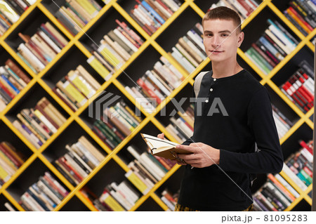 Young Man in Library 81095283
