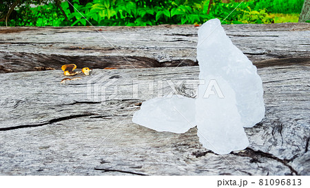 Alum on wood plank. Concept for body deodourant and vegetable preservation Alum on wood plank. Concept for body deodourant and vegetable preservation 81096813