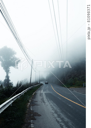 Mountain road in rainy and foggy day Mountain road in rainy and foggy day 81098371