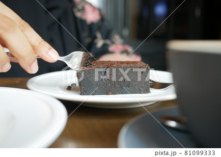 slice of brownie on plate on table slice of brownie on plate on table 81099333