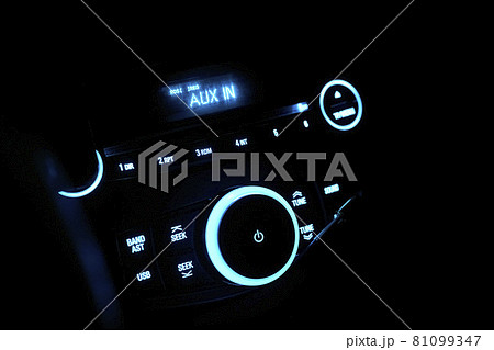 Automobile stereo in neon light at night. Dashboard with audio equipment in cabin of the modern new car 81099347