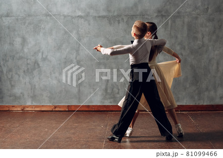 Young boy and girl dancing ballroom dance Viennese Waltz 81099466