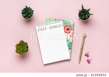 open notepad with text Goals 2022 goals, succulents, golden pen on pink background, spiral notebook on table Business, planning, education concept open notepad with text Goals 2022 goals, succulents, golden pen on pink background, spiral notebook on table Business, planning, education concept 81099859