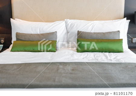 Modern bedroom with bed in a hotel 81101170