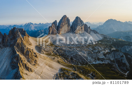 Stunning aerial view of Tre Cime di Lavaredo during sunset, Dolomites, Italy 81101789