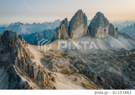 Epic aerial view of Tre Cime di Lavaredo during sunset, Dolomites, Italy 81101862