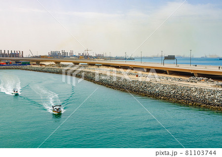 View of speed motor boat going on high speed near coast line 81103744