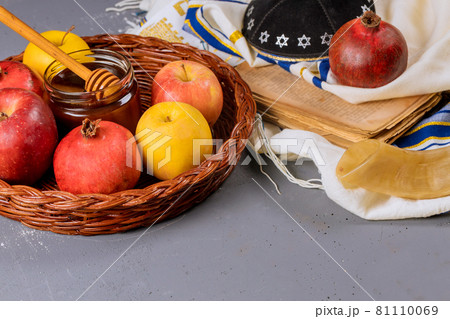 A jewish new year with honey for the apple and pomegranate holiday of Rosh Ha Shana 81110069