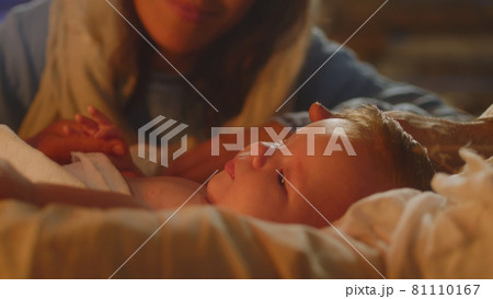 Mother Mary kissing baby Jesus 81110167