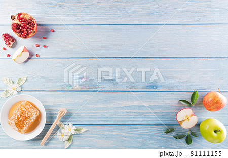 Rosh hashanah (jewish New Year holiday), Concept of traditional or religion symbols on pastel blue wooden background. 81111155