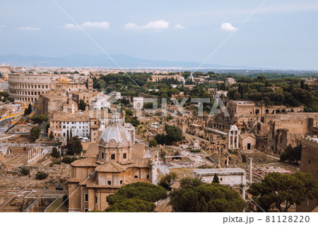 Panoramic view of city Rome with Roman forum and Colosseum from Vittoriano Panoramic view of city Rome with Roman forum and Colosseum from Vittoriano 81128220