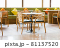 Simple table and chair set in a restaurant 81137520