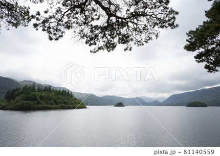 Keswick, English Lake District, U.K. 28 July, 2021. Beautiful view of the lake, beach and mountains. 81140559