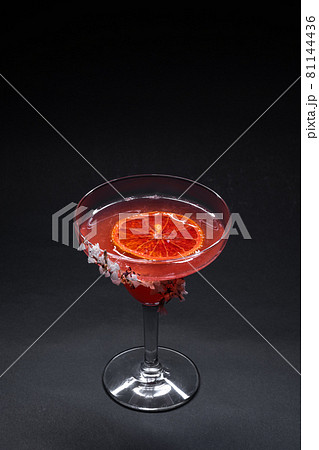 hemingway daiquiri cocktail drink with grapefruit in glass on black background hemingway daiquiri cocktail drink with grapefruit in glass on black background 81144436