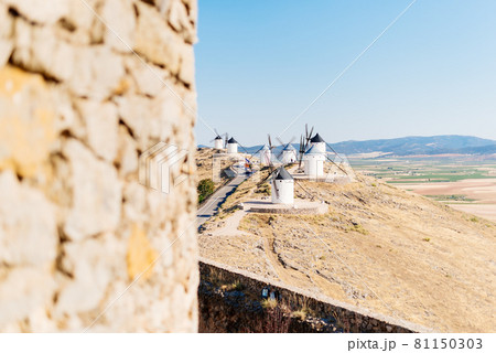 Group of historic windmills on a hillside Group of historic windmills on a hillside 81150303