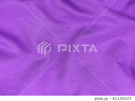 Purple jersey fabric matte texture top view. Violet knitwear satin background. Fashion color feminine clothes trend. Purple jersey fabric matte texture top view. Violet knitwear satin background. Fashion color feminine clothes trend. 81150325