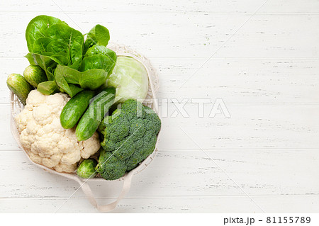 Eco friendly mesh shopping bag with fresh vegetables Eco friendly mesh shopping bag with fresh vegetables 81155789