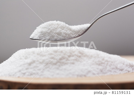 Spoon with natural sweetener stevia on a heap 81159131