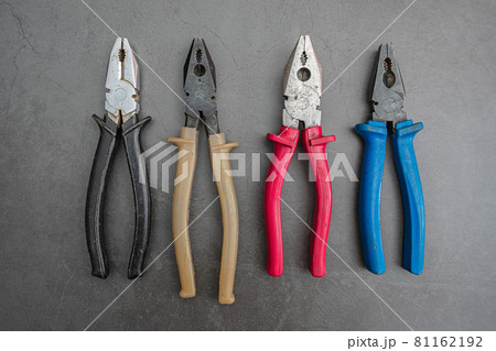 Old set of pliers of different sizes and calibers for home renovations Old set of pliers of different sizes and calibers for home renovations 81162192