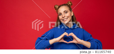 Panoramic photo of young happy positive attractive blonde woman with two horns with sincere emotions 81165740