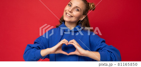 Panoramic photo of young happy smiling positive attractive blonde woman with sincere emotions 81165850