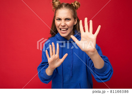 Photo of emotional angry young beautiful nice blonde woman with two horns with sincere emotions Photo of emotional angry young beautiful nice blonde woman with two horns with sincere emotions 81166386