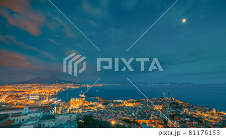 Naples, Italy. Skyline Cityscape In Evening Lighting. Tyrrhenian Sea And Landscape With Volcano Mount Vesuvius. City In Night Illuminations 81176153