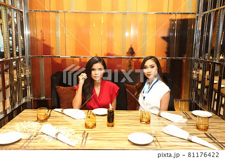 LGBTQIA+ two women have Lunch in restaurant on Dating. 20s young Lovely Friends feels happy smile LGBTQIA+ two women have Lunch in restaurant on Dating. 20s young Lovely Friends feels happy smile 81176422