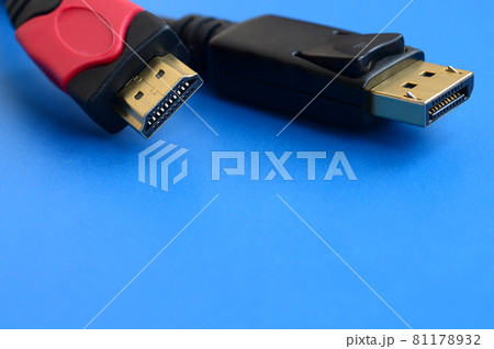 Audio video HDMI computer cable plug and 20-pin male DisplayPort gold plated connector for a flawless connection on a blue background 81178932