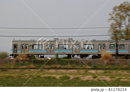 座間市入谷付近をゆく相模線205系電車 81179154