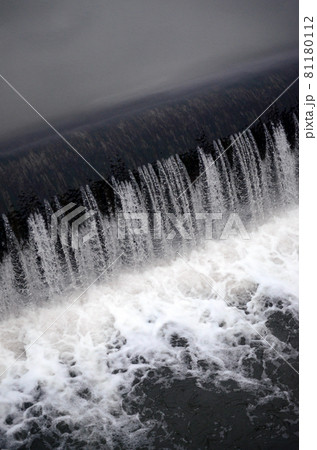 A picture of the flowing water. The dam is designed to regulate the water level in rivers within the city and to provide technical water to industrial objects 81180112
