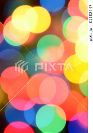 Blurred festive colorful lights over black useful as background. All main colors included. Red, yellow, green and blue Blurred festive colorful lights over black useful as background. All main colors included. Red, yellow, green and blue 81182547