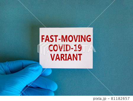 British fast-moving variant covid-19 symbol. Hand in blue glove with white card. Concept words 'fast-moving covid-19 variant'. Medical and COVID-19 pandemic fast-moving variant concept. Copy space. 81182657
